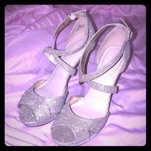 Silver prom heels with adjustable strap.